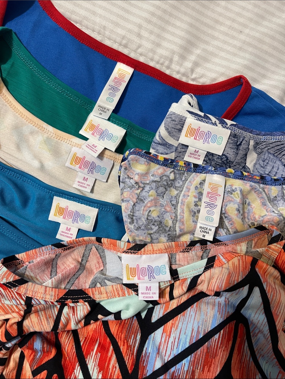 LuLaRoe Assorted Women’s Short Sleeve Tees in Blue, Green, Red, Cream - Picture 16 of 16